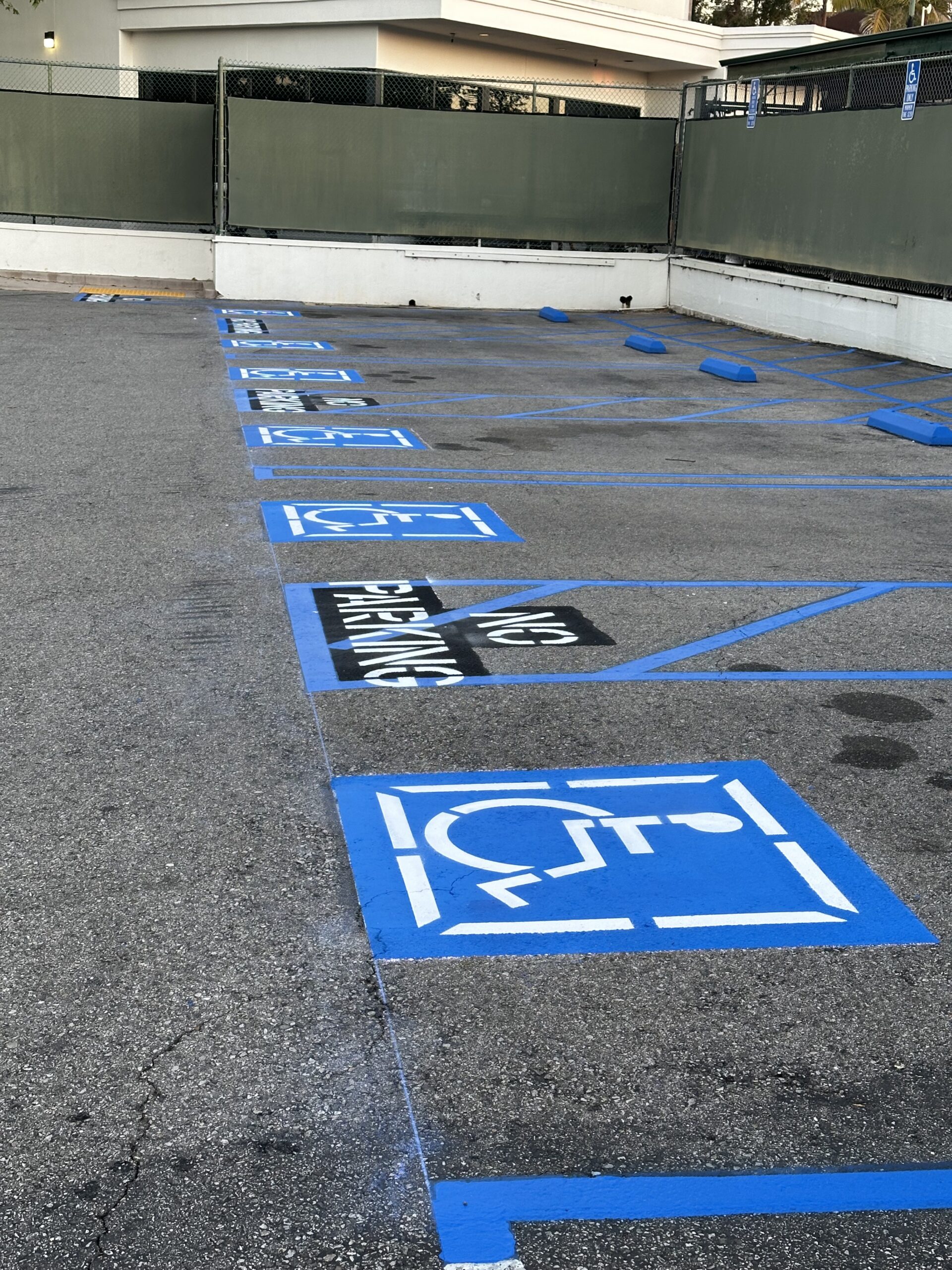 ADA handicap parking striping California — ISA symbol access aisle CBC Title 24 compliant — Bowman Line Striping Inc CA #1138257